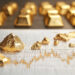Several gold nuggets are placed on a financial chart showing an upward trend, with gold bars blurred in the background, suggesting the concept of gold value and investment growth. | GoldZeus.com